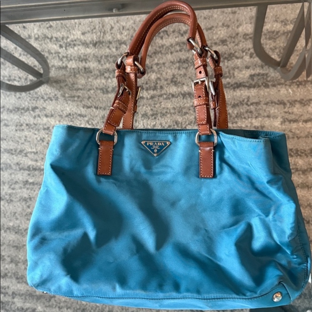 Temp hold💕Prada Teal Tote with Leather Handles
Dust bag from real real included
